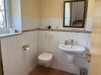 Gäste-WC - Endlich Zuhause: Ruhiges Wohnen mit Einfamilienhaus-Charakter.