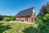 Gartenansicht - Neuwertiges Einfamilienhaus