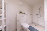 Duschbad Bild 01 - Zur Kapitalanlage – vermietete Neubauwohnung