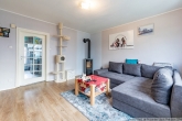 Wohnzimmer mit Kamin - Sonntagsbesichtigung am 18.05.2025 um 10 Uhr.
