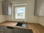 Blick beim Kochen - Servicewohnen für Senioren mit traumhafter Dachterrasse!