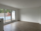 Wohnzimmer - Erstklassiges Wohnen in der Großen Gänseweide – modern & mit Dachterrasse!