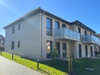 Ansicht Haus 5a - Willkommen zu Hause: Neubauwohnung mit modernstem Komfort und stilvoller Ausstattung