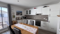 Offene Einbauküche - Exklusive Dachgeschosswohnung mit Panoramablick und Sonnenbalkon