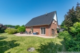 Gartenansicht - Neuwertiges Einfamilienhaus