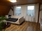 Wohnzimmer - Dachgeschoss - Wohn- und Geschäftshaus mitten in Winsen (Luhe)